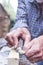 Close up of male hands doing woodwork using tools