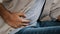 Close-up of male hands holding belly by side unrecognizable man feels bad digestive problems abdominal pain illness