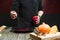 Close-up of male hands preparing modern molecular dish