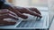 Close up male hands typing on keyboard. Unrecognizable business man caucasian manager user working on laptop with