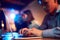 Close-up of male hands typing on laptop. Employees attending business meeting, conference. Blurred background with