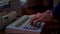 Close up of male hands typing on the old computer. Media. Man using old fashioned keyboard and typing a letter at work.