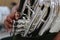 Close-up of a male musician playing the euphonium.