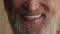 Close up male white healthy teeth smiling cropped view happy satisfied smile cheerful positive unrecognizable old senior