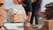 Close up of a man building a brick house. Laying red bricks on a construction site on a sunny day. house construction