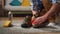 Close up man cleans shoes from dirt with a special brush