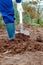 Close up of a man digging soil