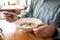 Close-up man eating mushroom cream soup