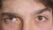 Close-up of man eyes opening