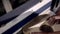 Close-up of man grinds wood products on industrial machine. Action. Carpenter polishes wooden product for tape