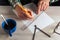 Close-up of a man hands holding a pencil and a ruler. Working environment on the office table before creating a plan for or