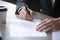 Close up man hands on the table, the man signing the contract