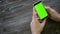 Close Up Man Holding Smartphone Touch With Green Screen Chroma Key