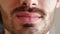 Close-up of man lips sending kiss