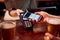 Close Up Of Man Paying For Drinks At Bar Using Contactless App On Mobile Phone