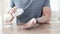 Close up of man pouring pills from jar to hand