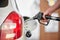 Close-up of a man pumping diesel in to the tank