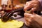 Close Up Of Man Restoring Violin In Workshop