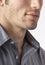 Close-up of man`s chin and jawline with facial hair beard stubble five o`clock shadow. Men`s personal care and grooming