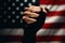 Close-up of a man& x27;s hand clenched in a fist. flag America