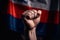 Close-up of a man's hand clenched in a fist. Flag Rossia