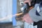 Close up of a man sharpen an ax using electric grinder