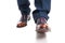 Close-up of man shoes and trousers in walking position