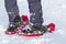 Close-up of man skier feet and legs in short plastic bright prof