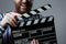 Close-up of a man smiling clapperboard cinema