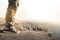 Close up of man standing on top of a mountain.