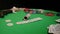 Close-Up of Man Throwing a Poker Chips in slow motion. Close-up of hand with throwing gambling chips on black background