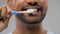 Close up of man with toothbrush cleaning teeth