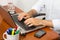 Close up of man typing in modern laptop, minimalist composition