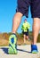 Close up of man walking in nature with jogger in background