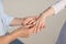 Close-up man and woman hand touching holding together on blurred background for love and healing concept.