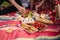 Close up of man and woman has non alcoholic picnic outdoors. Strawberry, lemonade, bread and other snacks