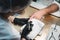 Close-up Of A Manicurist Cleaning Off The Cuticle From The Person`s Fingers