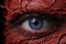 a close up of a mans eye with red skin