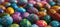 a close up of many colorful and painted eggs