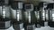 Close up of many metal black dumbbells on the floor at gym. Weight training equipment