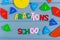 Close up mathematical fractions and colorful letters on gray background. Creative, fun mathematics banner. Education,