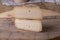 close up of maturated selection of cheese on old wood