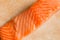 Close-up of the meat of a fresh raw salmon loin.