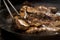 Close up of meat pieces freshly cooking on big pan