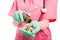 Close-up of medical nurse spilling a bottle of pills