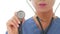 Close up of medical professional holding stethoscope