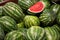 Close-up of mellow water-melons in box in supermarket