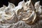 close-up of meringue, with fine texture and intricate swirls