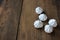 Close-up of meringue on a table. Marshmallows on wooden background.