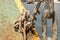 close-up of metal chains, rusty from salt water, attached to a fishing boat, rusty metal chains close up